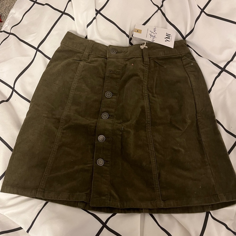 Cute green jean skirt never been used new with tags